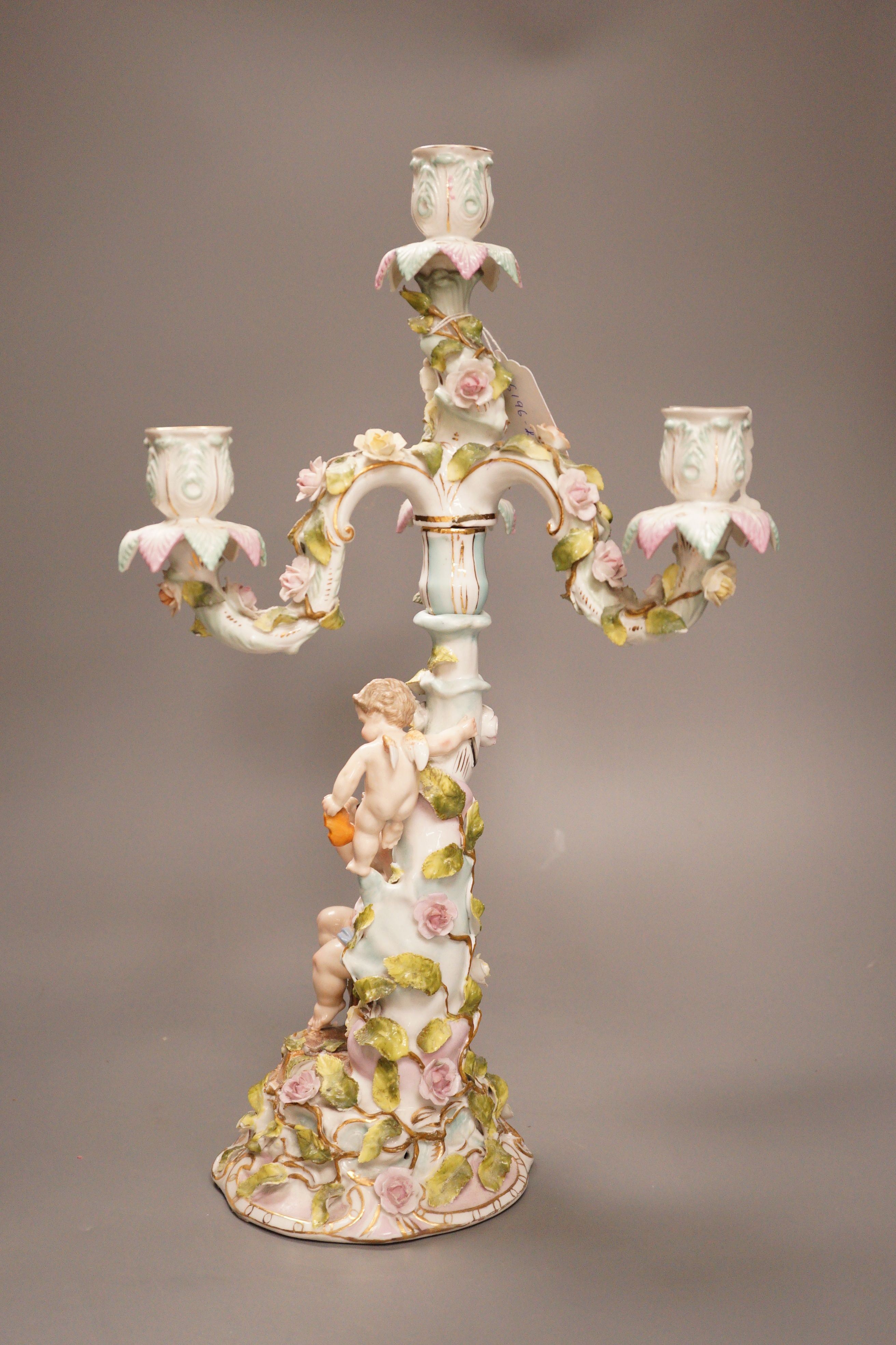 A Sitzendorf porcelain three branch, four light candelabrum, 45cm